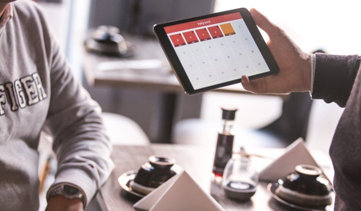 The customer selects the products from the store on the tablet